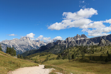 Mountain landscape with blue sky and clouds in Dolomites