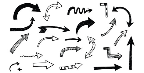Fototapeta premium Collection of hand drawn arrows in various shapes and directions on a white background