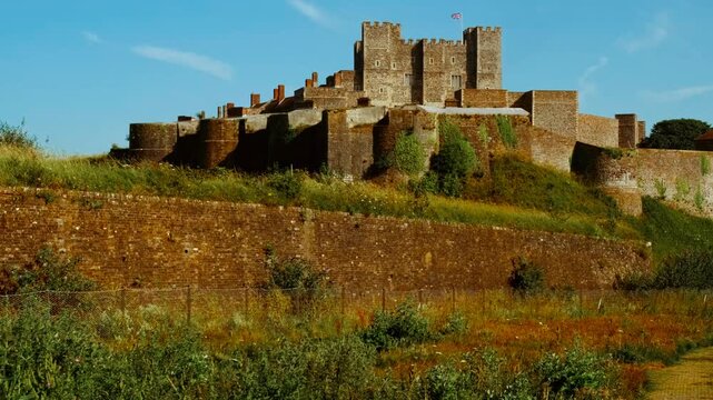 Dover Castle, Kent, England, UK, establishing view showing keep, curtain walls and hilltop setting above the Channel coast