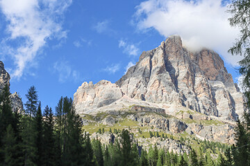 Looking towards the peak surrounded by white clouds