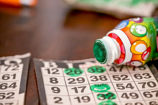 Bingo cards and markers display fun and excitement during a lively game night with friends