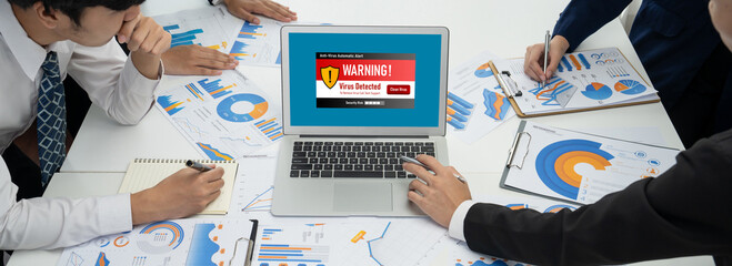 Virus warning alert on computer screen detected brisk cyber threat , hacker, computer virus and malware