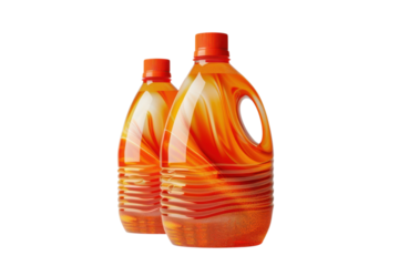 Two orange liquid bottles with handles stand side by side against a in a studio shot on transparent background
