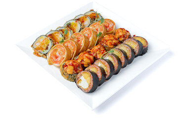 Sushi set on a white plate isolated