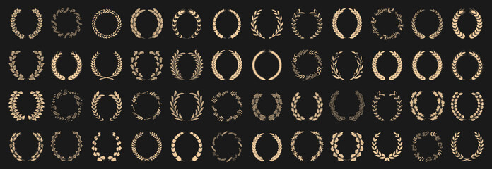 Laurel wreath collection in golden style. Elegant award and victory symbols. Ideal for certificates and premium branding © top dog