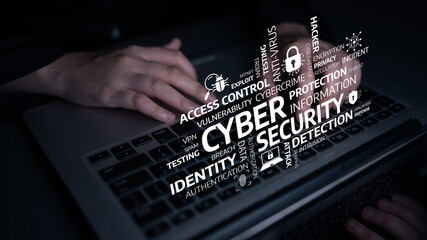 A conceptual image focused on cyber security featuring hands using a laptop with visual elements...
