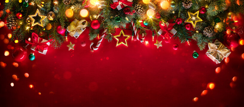 Christmas Red - Fir Branches With Ball And Glittering Lights In Winter Background - Decorations For Holiday