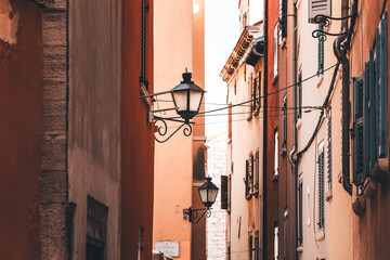 colorful windows and walls with lamps in the old town of rovinj, croatia