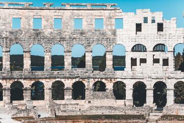 detail of the arches of pula arena in istria, croatia