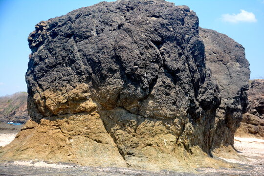 Large rocks on the shoreline at Playa San Juanillo in Guanacaste province, Costa Rica. 