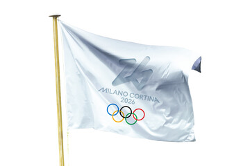 Fototapeta premium Photo of the logo of the 2026 winter olympics Milano Cortina on a flag on a pole isolated on white or transparent background, png cut out