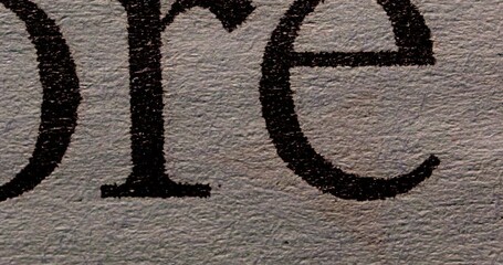 Dynamic Newspaper Texture Overlays. Sequence of rapidly shifting composite text layers on weathered newspaper surface, blending bold typographic elements in monochrome and colored hues.