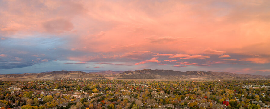 scenic sunrise cloudscape over Fort Collins and foothills of Rocky Mountains, fall scenery