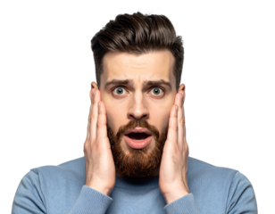 A bearded man with a shocked expression holding his hands to his face against a stark black background