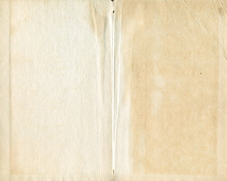 Vintage open book background. Natural old texture of  yellowed paper.