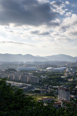 A Breathtaking Panoramic View of the Cityscape with Distant Mountains in the Background