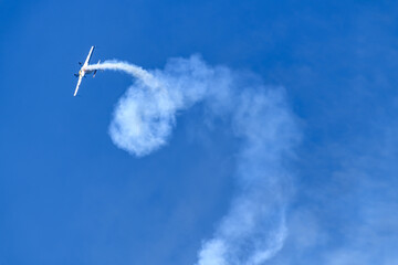 Acrobatic planes and helicopters perform stunning maneuvers in the sky during Festivolare 2025 airshow, thrilling the crowd with aerial stunts.