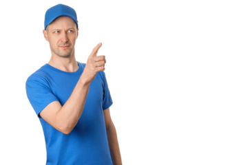 Man in blue shirt and cap gestures with finger pointing, looking serious.