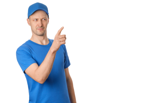 Man in blue shirt and cap gestures with finger pointing, looking serious.