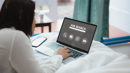 Woman searching job online on laptop, job search and career concept in digital age