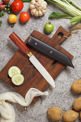 photo of a kitchen knife specifically for cutting vegetables and fruit, mirror and satin knife material
