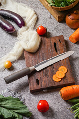 photo of a kitchen knife specifically for cutting vegetables and fruit, mirror and satin knife material