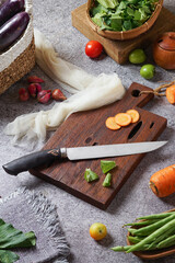 photo of a kitchen knife specifically for cutting vegetables and fruit, mirror and satin knife material