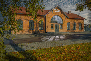 Fototapeta premium The railway station building and its surroundings in Zdunska Wola, Poland.