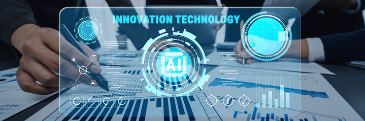 A professional setting showcasing innovative technology and AI in action. Team members engage in data analysis, emphasizing the importance of technology in modern business strategies. Trope