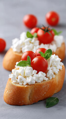 Fresh cherry tomato and cottage cheese on sliced bread with green herb garnish