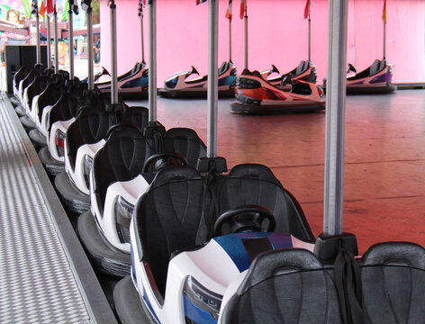 A Row of Bumper Dodgem Cars on a Fun Fair Ride.