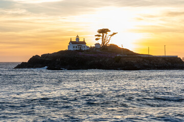 Crescent City lighthouse at sunset