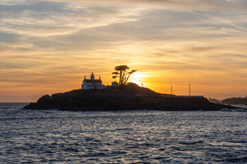 Crescent City lighthouse at sunset