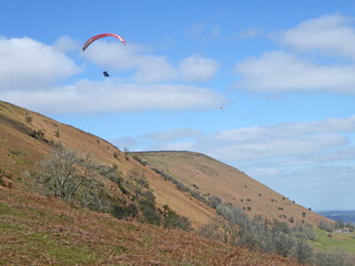 Paraglider in the hills above Pandy in Wales	