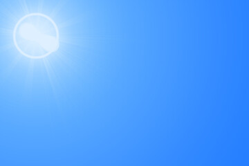 Sun in blue sky. Bright warm sun and lens flare in clear summer sky, sunlight with sunshine glare rays.