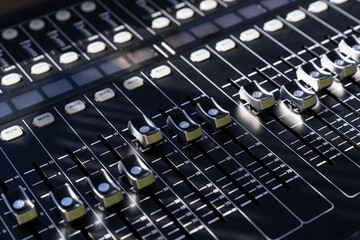 Mixer control. Music engineer. Backstage controls on an audio mixer, Sound mixer. Professional audio mixing console with lights, buttons, faders and sliders. sound check for concert. live broadcast.