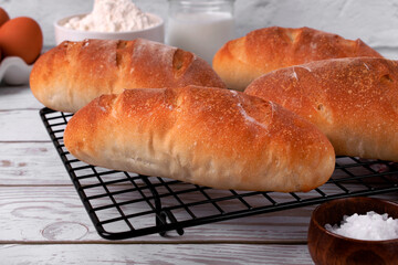 Sourdough bread loaf for making sandwiches on baking rack