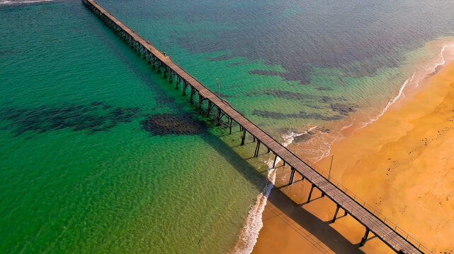 View of a wooden pier on a paradise beach to avoid contact with the sand