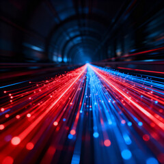 Red and blue fiber optic light streams moving at high speed through a dark tunnel, symbolizing data transfer and internet technology.