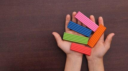 Creative kids activity concept showing early childhood development, art, and imagination. Concept of learning, creativity, and fun through play