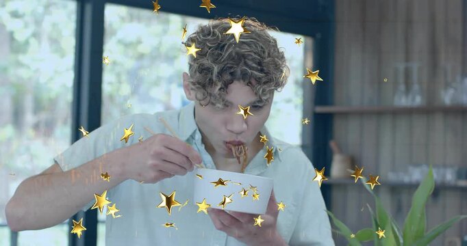Man picking up noodles with chopsticks and causing golden star animation tasting food flavor