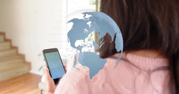woman tapping smartphone in living room, 3D globe overlay appearing, rotating for app navigation - Powered by Adobe