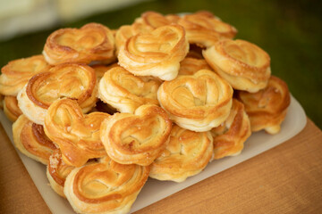 Sweet pastries on the table. Homemade cakes. Lots of sweet treats.