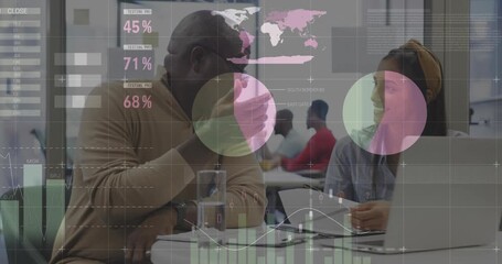 Consultant and colleague scanning report and pointing as data charts rising for business review - Powered by Adobe