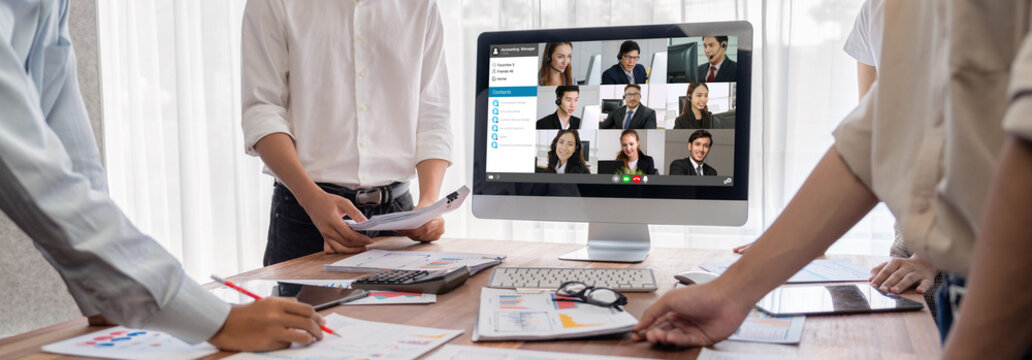 Business people on video conference for brisk virtual group meeting of corprate business office workers