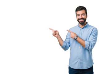 Cheerful young man pointing sideways at empty space