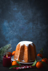Pandoro star, Christmas Venetian sweet bread in powdered sugar, the symbol of the snow-capped Alpine peaks. Christmas and New Year Italian holidays sweets