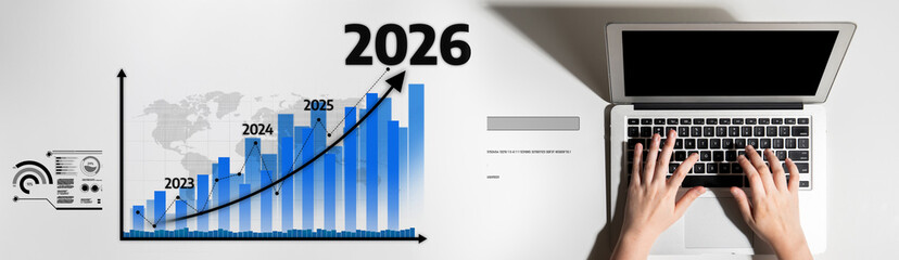 Fototapeta premium A detailed growth projection chart for 2026 alongside a laptop workspace, showcasing future business trends and digital analysis integral for corporate strategy and development. Tessel