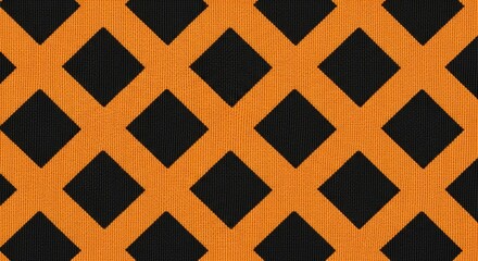 Seamless orange and black geometric diamond pattern textile background