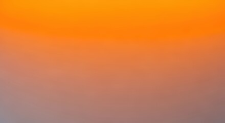 Fototapeta premium Vibrant orange and blue gradient background with soft lighting